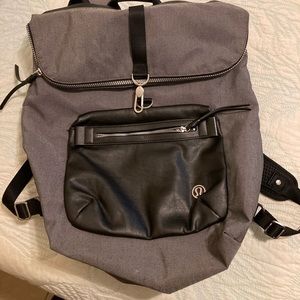 Selling back pack grey with black like new condition
